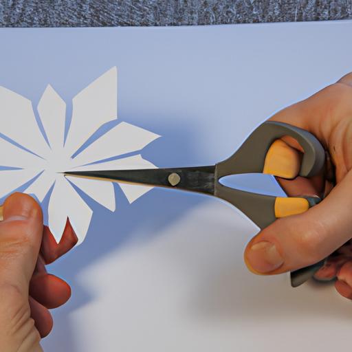How To Cut A Snowflake Out Of Paper
